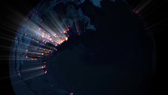 The planet Earth rotating in black space as city lights shoot flare out (Loop).
