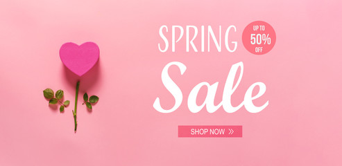 Spring sale message with heart flower top view flat lay