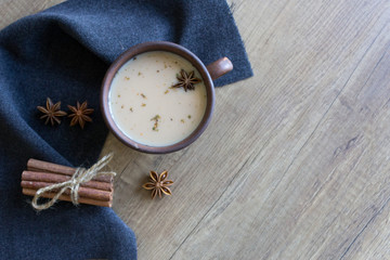 Coffee with milk. Cinnamon and spices