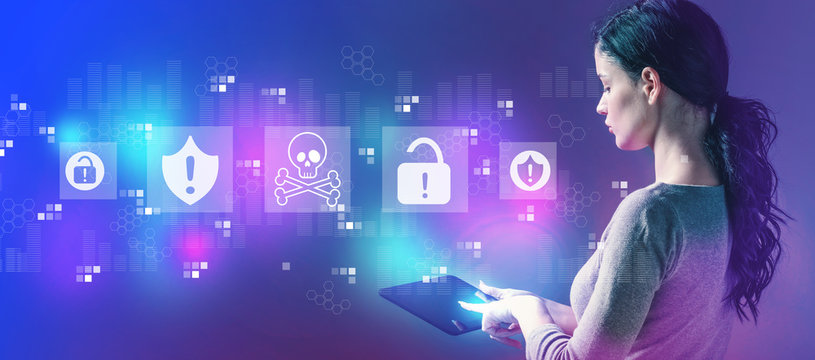 Virus and scam theme with business woman using a tablet computer