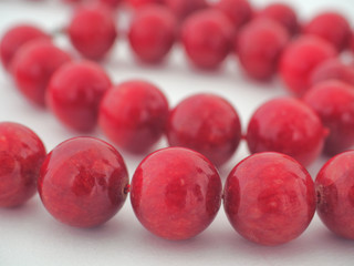 Mixed colors beads close-up made from natural stones or glass marbles