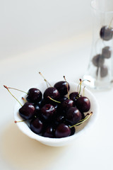 juicy dark cherries on a white background 1