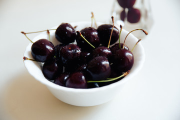 juicy dark cherries on a white background 1