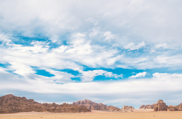 Fototapeta na wymiar Beautiful blue sky in Jordanian desert in Wadi Rum.