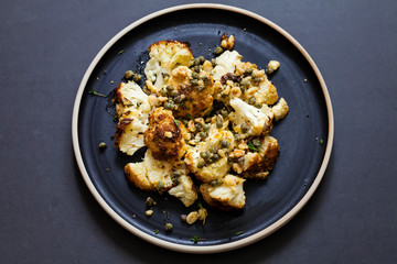 Roast cauliflower with capers and hazelnuts