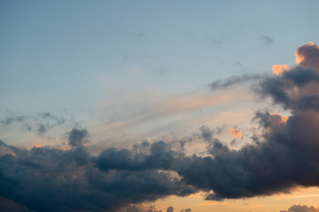 Beautiful colorful sky with clouds, view of the orange, blue, red and white sky, nature scenery, sunset