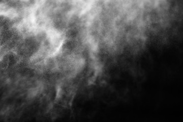 A stream of water and a cloud of drops