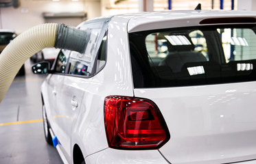 Engineers are using professional instruments to detect closed tests in car interiors