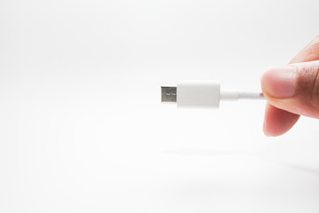 USB type-C cable connector on a white background. 