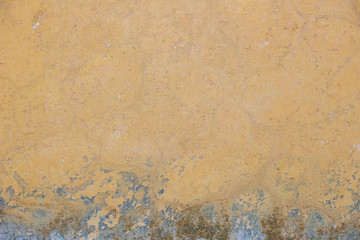 The texture of the old cement wall with scratches, cracks, dust, crevices, roughness, stucco. Can be used as a poster or background for design.