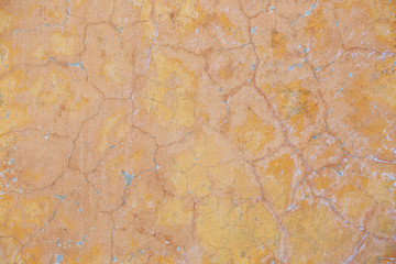 Fototapeta na wymiar The texture of the old cement wall with scratches, cracks, dust, crevices, roughness, stucco. Can be used as a poster or background for design.