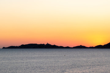 Fototapeta premium sunset over the mediterranean sea and the castle of If, Marseille