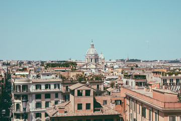 Fototapeta na wymiar Panoramic view of city Rome with old houses from the Spanish steps