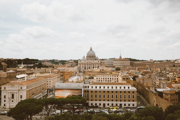 Fototapeta na wymiar Panoramic view on the Papal Basilica of St. Peter in Vatican and city of Rome