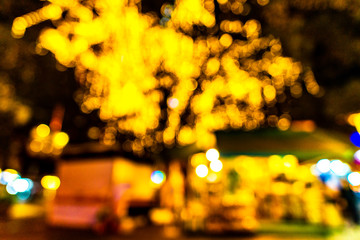 blur image of night festival on street blurred background with bokeh