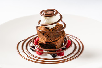 brownie with ice cream and berries