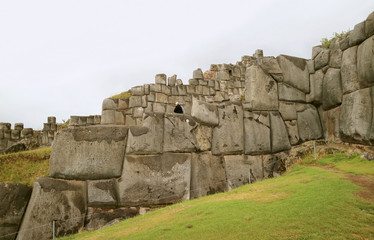 Fototapeta na wymiar Amazing huge ancient Inca stone wall of Sacsayhuaman fortress, Cusco, Peru, South America 