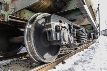 Close-up of train wheels. Bottom view. Winter