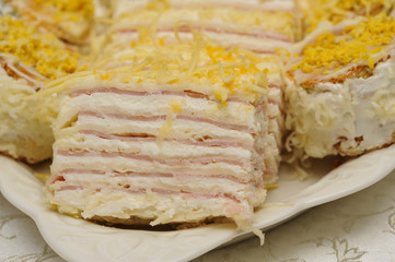 .A deliciously salty appetizer with cheese served on a plate. Tasty meal served on a plate.