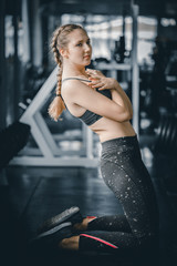 Portrait young attractive healthy woman body curve fitness doing exercises workout with ball in gym. People beauty perfect body slim fitness girl. Freedom happy and relax lifestyle healthcare concept.