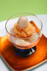 tangerine sorbet with lychees over gooseberry liqueur