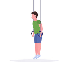sporty man doing ring dips exercises with gymnastic rings african american guy training in gym cardio crossfit workout healthy lifestyle concept flat white background full length