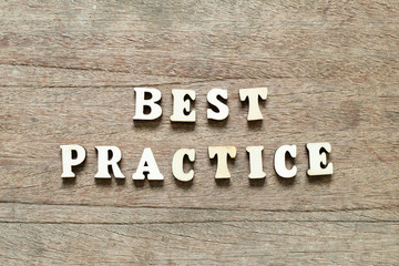 Letter block in word best practice on wood background