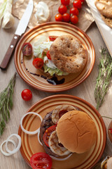 Two burger, vegan burger and beef patty burger