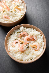 Top view of two portions of ochazuke or chazuke with shrimps