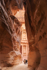 The Treasury cliff temple viewed from the Siq gorge entrance, Petra, Jorda