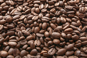 Roasted coffee beans background. Coffee beans concept. Top view.