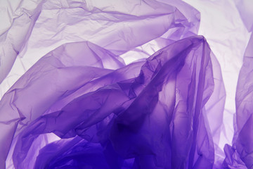 Plastic bag background. Violet texture. Background element for text and design. Concept view.