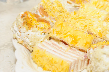 .A deliciously salty appetizer with cheese served on a plate. Tasty meal served on a plate.