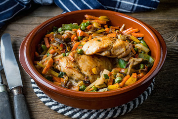 Fried chicken fillet with vegetables.