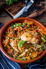 Fried chicken fillet with vegetables.