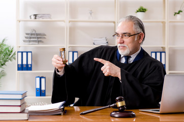 Aged lawyer working in the courthouse  