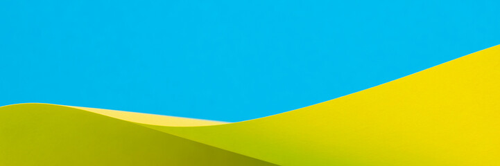 Abstract colorful banner background. Yellow blue color paper in geometric shapes