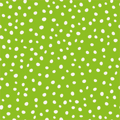 White hand drawn circular paint dots in scattered design. Seamless vector pattern on green background. Great as coordinate, for stationery, giftwrap, wellbeing, natural, organic products, home decor