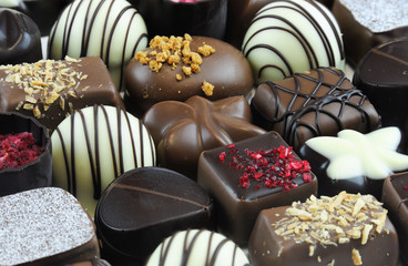 Close up on various colorful chocolate as gift