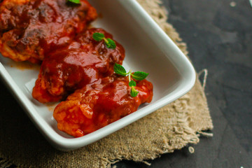 meatballs (minced meat) in tomato sauce (cutlets, minced meat). food background. copy space