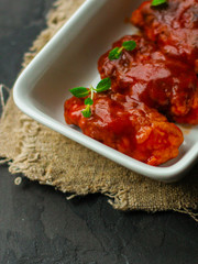 meatballs (minced meat) in tomato sauce (cutlets, minced meat). food background. copy space