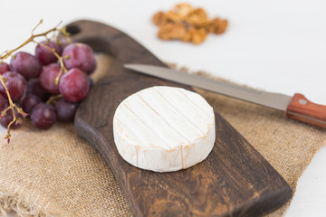 Blue cheese or brie with grapes and nuts