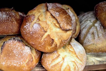 round bread with a crust on the counter