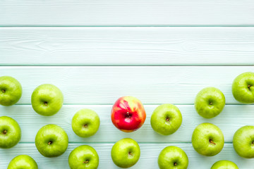 green apples for organic summer food pattern on light wooden background top view mockup