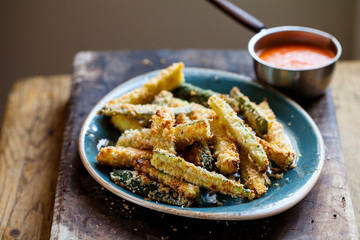 Zucchini fries with roast pepper and tomato sauce