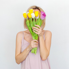 Woman 35 years old with a bouquet of flowers