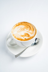 cup of cappuccino on the white background
