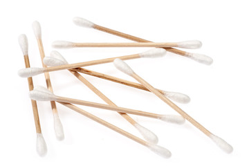 Eco-friendly materials. Wooden, cotton swabs on a white background.