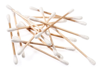 Eco-friendly materials. Wooden, cotton swabs on a white background.