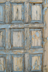 .Texture of the old door. Peeling paint, peeling. Background.